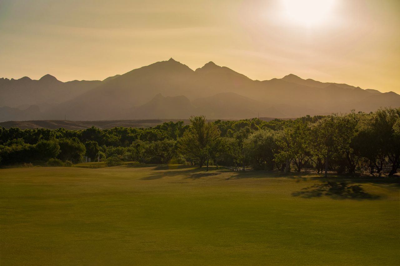 Golden hour over the Tubac fairways with the Santa Rita mountains behind