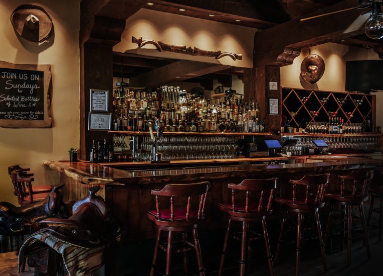 The Bar at Stables with real horse saddles as bar stools